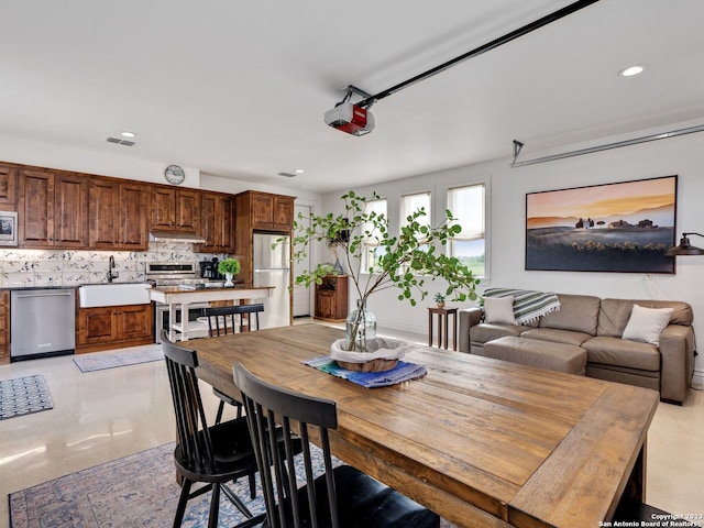 dining room featuring sink