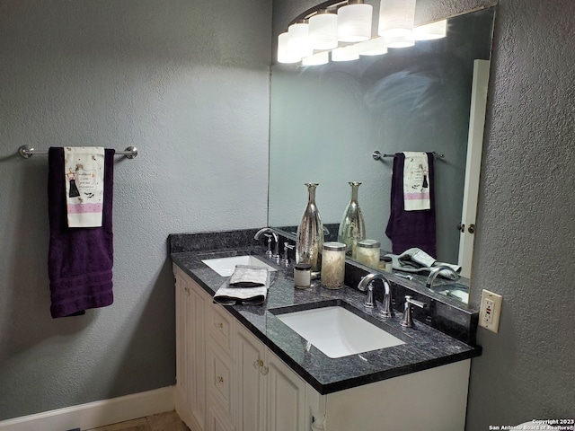 bathroom featuring double sink and oversized vanity