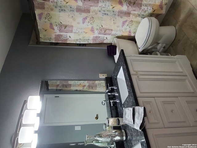 bathroom featuring toilet