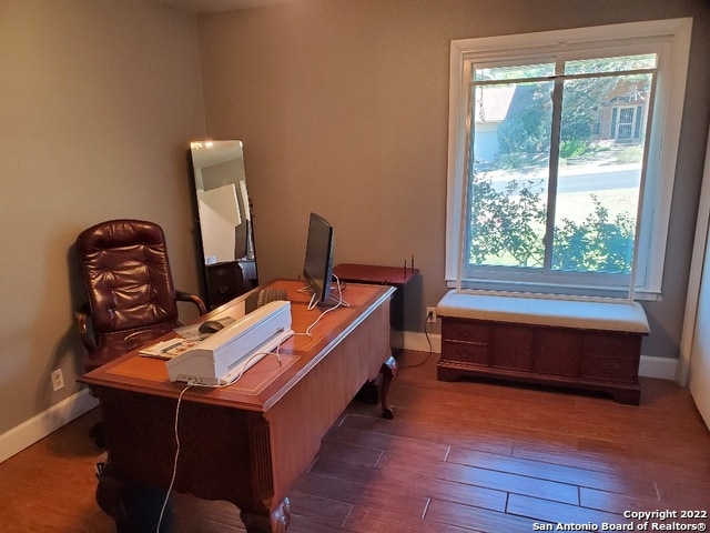 office space featuring dark hardwood / wood-style flooring