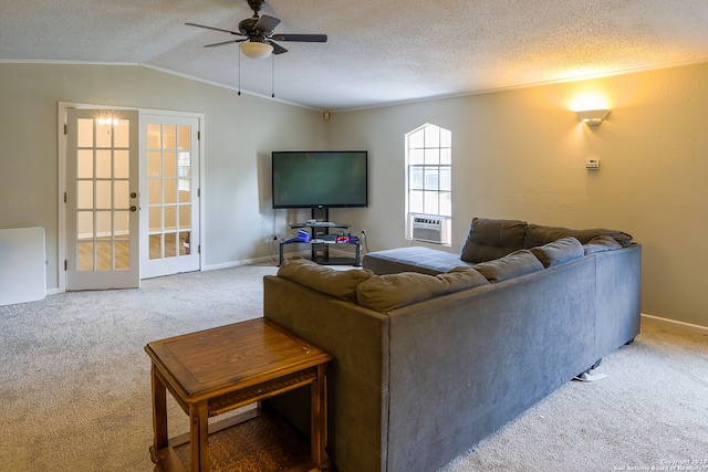 living room with french doors, ceiling fan, light carpet, a textured ceiling, and lofted ceiling