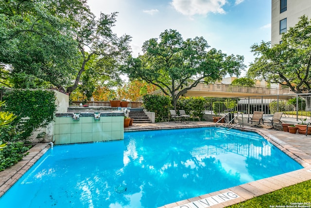 view of pool with a patio area