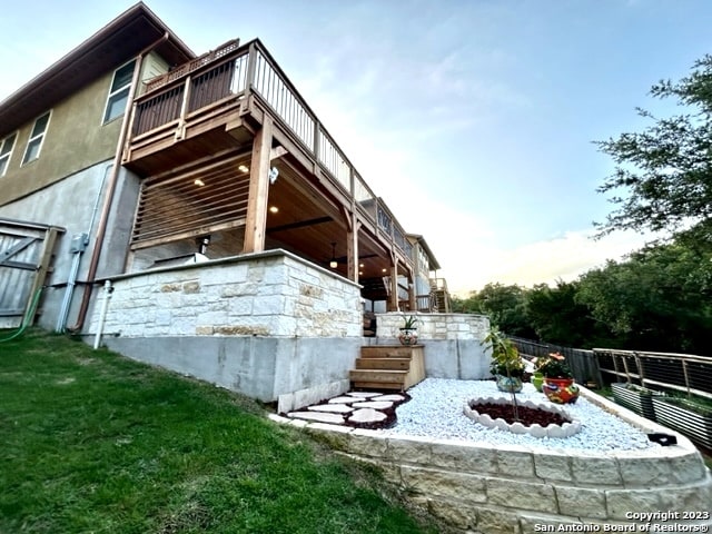 view of home's exterior with a lawn