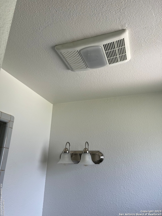 interior details with a textured ceiling