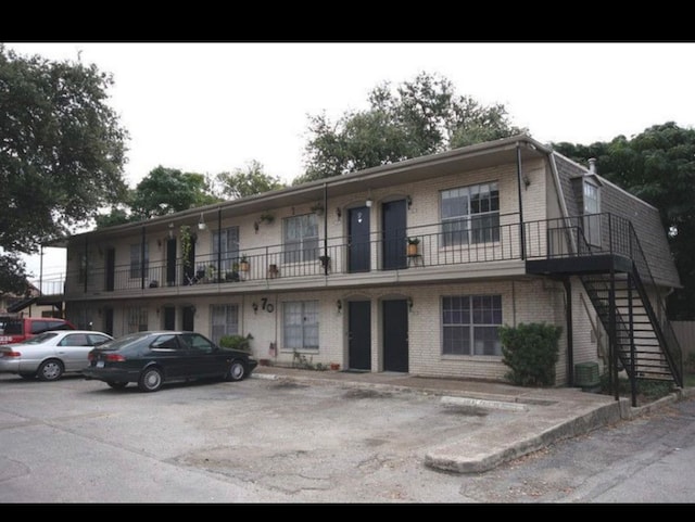 view of property with central AC unit