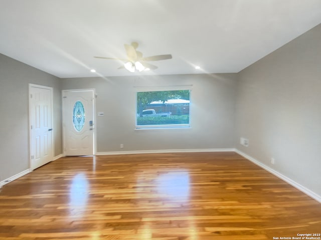 foyer featuring ceiling fan and hardwood / wood-style floors