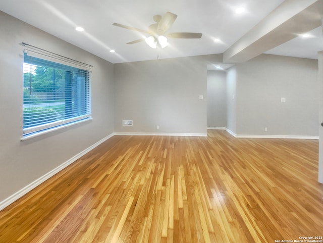 unfurnished room featuring light hardwood / wood-style floors and ceiling fan