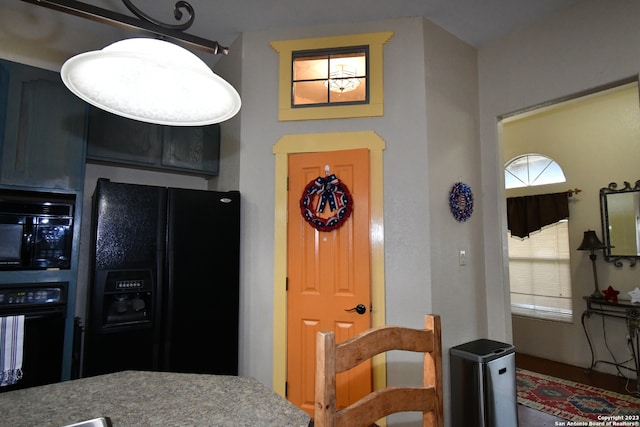 interior space with black appliances