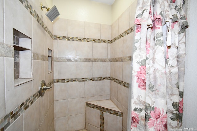 bathroom featuring walk in shower