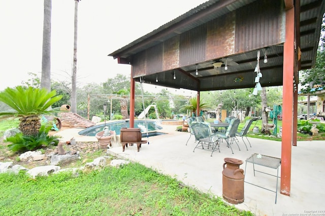 view of patio with a gazebo and ceiling fan