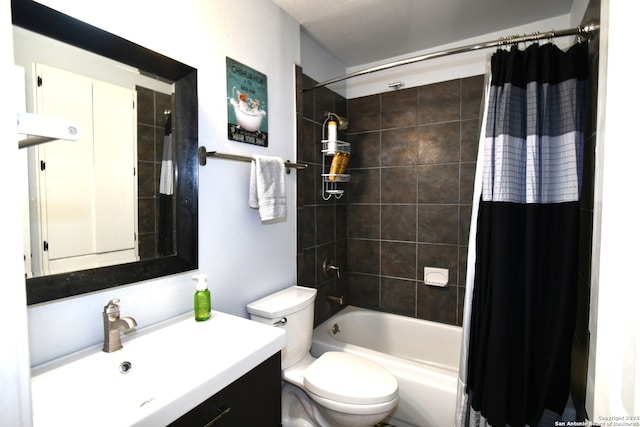 full bathroom featuring vanity, shower / bath combo, and toilet