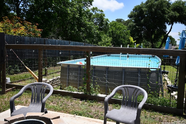 exterior space with a pool