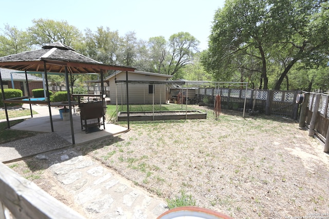 view of yard with a patio and a gazebo