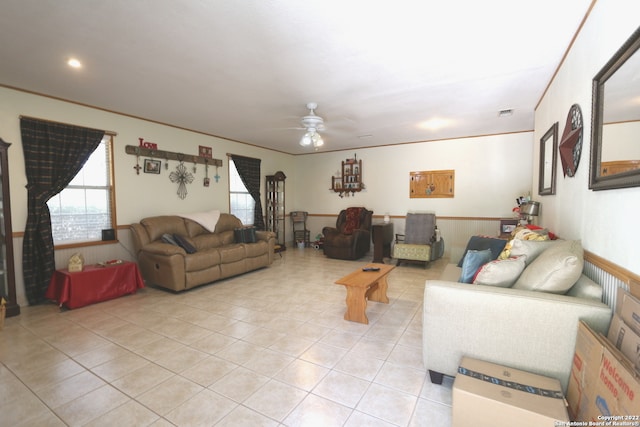 tiled living room with ceiling fan