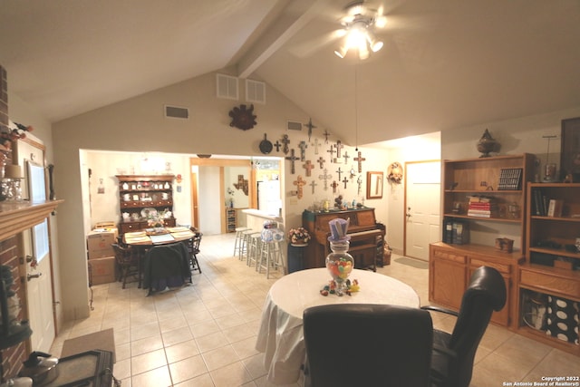 dining room with light tile floors, ceiling fan, high vaulted ceiling, and beam ceiling