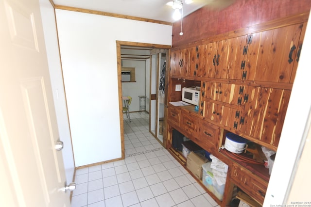 hallway with light tile floors