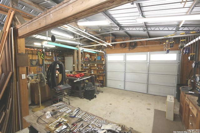 garage with a workshop area