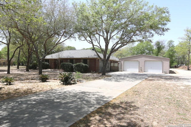 ranch-style house featuring a garage