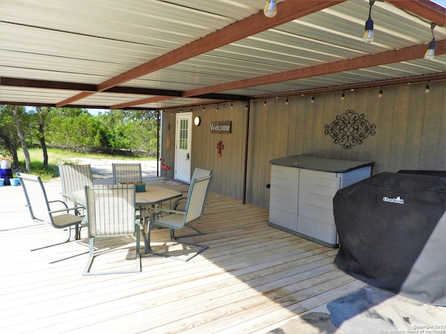 wooden deck featuring grilling area