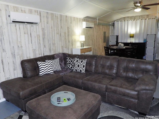 carpeted living room with a wall mounted air conditioner, ceiling fan, and vaulted ceiling