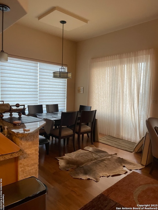 dining room featuring dark hardwood / wood-style flooring