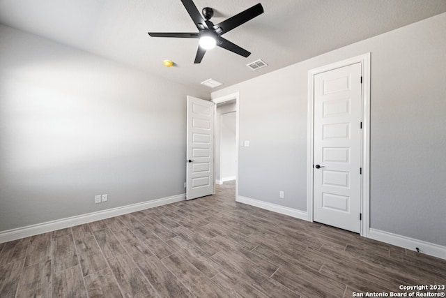 unfurnished bedroom with wood-type flooring and ceiling fan