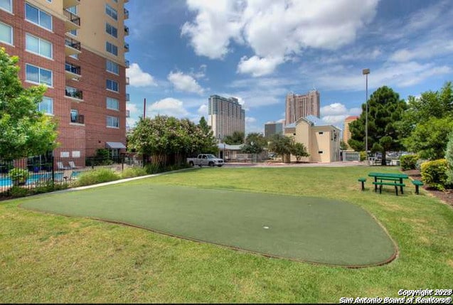 view of community with a yard