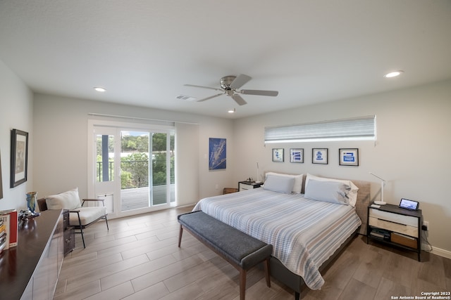 bedroom featuring access to exterior, ceiling fan, and light wood-type flooring