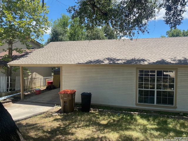 view of home's exterior with a lawn