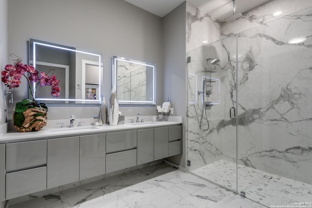 bathroom featuring a shower with door, tile floors, and dual vanity