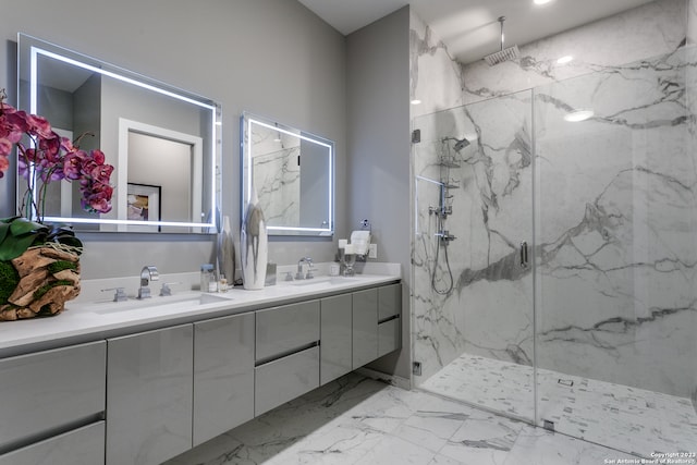 bathroom featuring tile floors, oversized vanity, double sink, and walk in shower