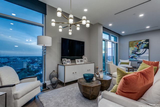 living room featuring a notable chandelier