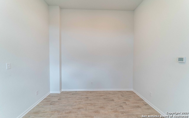 empty room featuring light hardwood / wood-style floors