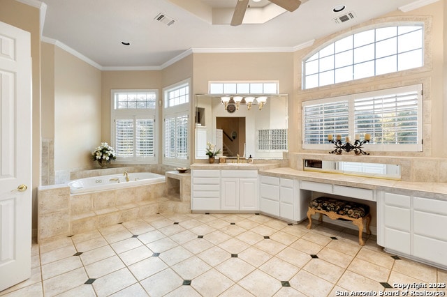 bathroom with ceiling fan, vanity, tiled bath, ornamental molding, and tile flooring