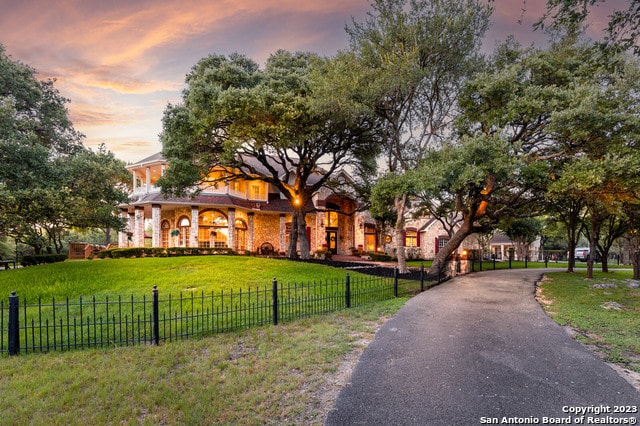 view of front of house with a lawn