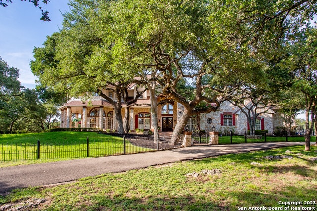 view of front of home with a front lawn