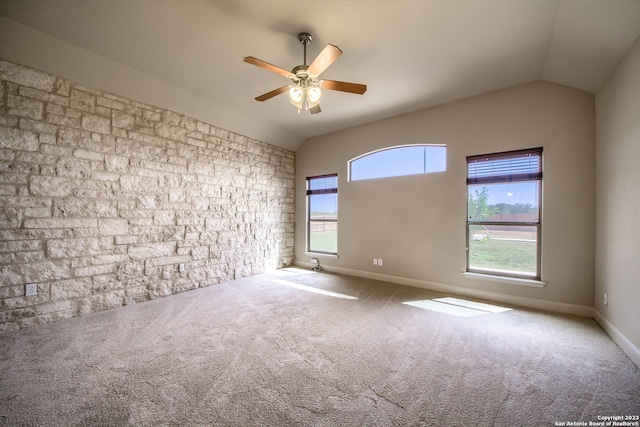 unfurnished room featuring light carpet, plenty of natural light, and ceiling fan