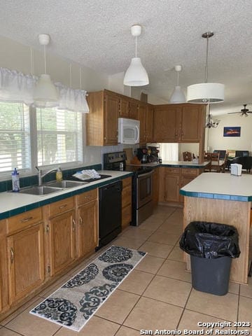 kitchen with light tile flooring, range with electric cooktop, black dishwasher, hanging light fixtures, and sink