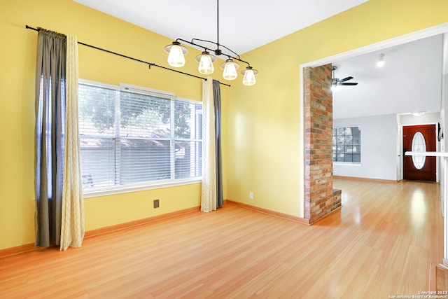 spare room with ceiling fan and light hardwood / wood-style floors