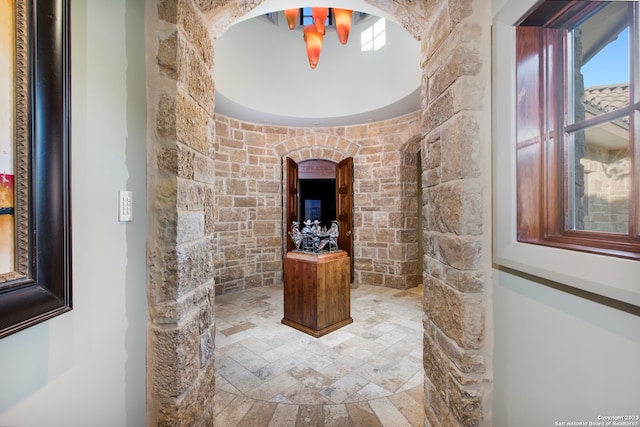 bathroom with a chandelier