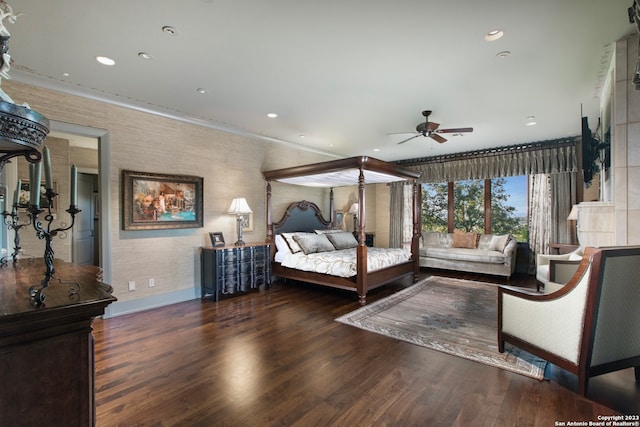 bedroom featuring ceiling fan and dark hardwood / wood-style flooring