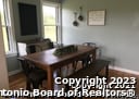 dining area with dark wood-type flooring