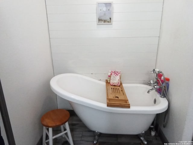 bathroom with a tub