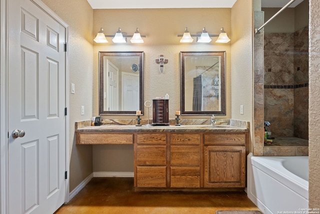 bathroom with a bathing tub and double vanity