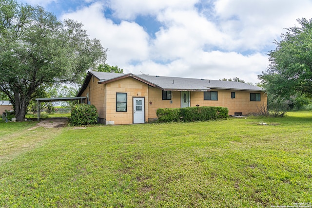 view of front of home with a front lawn