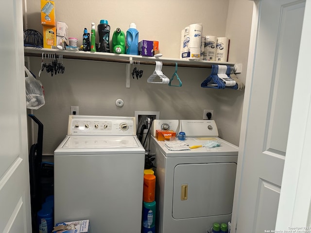 laundry room featuring washing machine and dryer, hookup for a washing machine, and electric dryer hookup