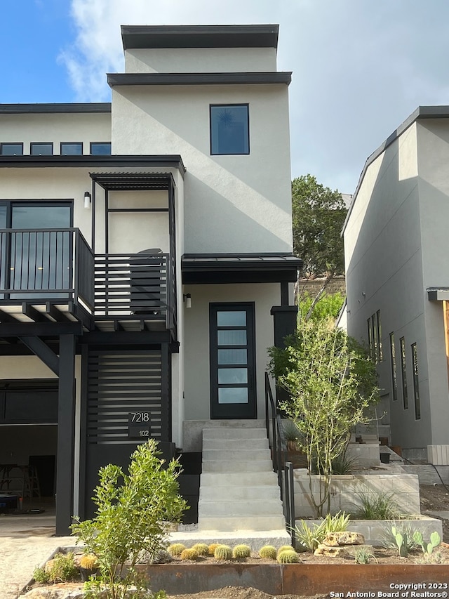 modern home featuring a balcony