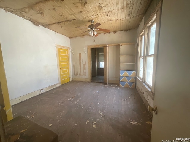 spare room with ceiling fan and wood ceiling