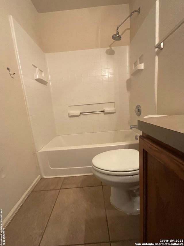 full bathroom with toilet, tile floors, vanity, and tub / shower combination