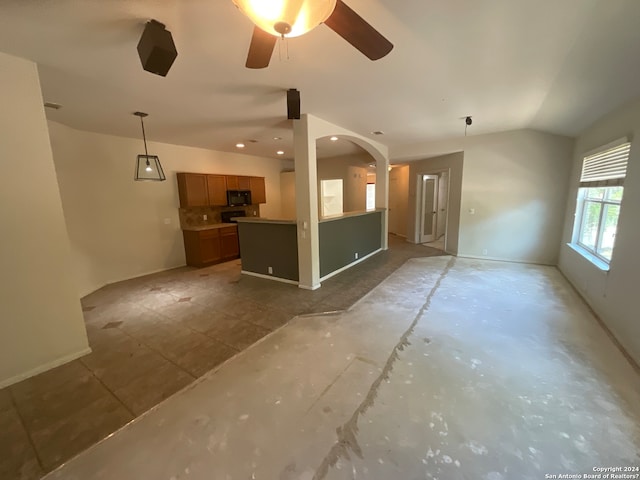 unfurnished living room with ceiling fan